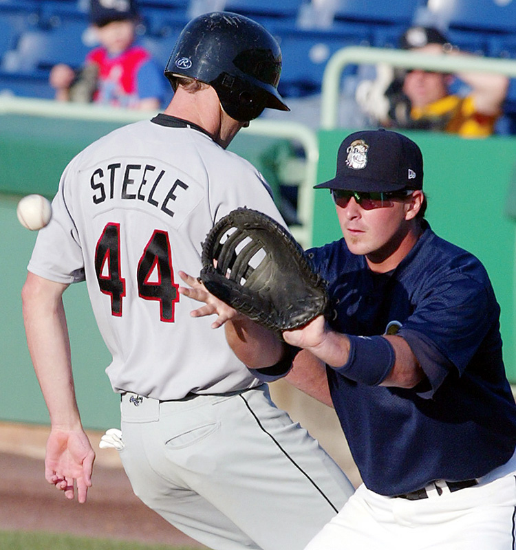 NOT THIS TIME: Scrappers first baseman Zach Booker, right, waits to make the catch as ValleyCats baserunner T.J. Steele gets back to first safely during a pickoff attempt Monday at Eastwood Field.