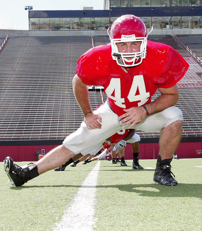 LINEBACKER PREPARATION: Linebacker Mike Barlak works his legs during Youngstown State's football practice on Monday.