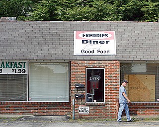 One person was shot to death and another seriously wounded this morning during a robbery at a North Park Avenue restaurant and social club. Police are looking for at least one black man who went into Freddie’s Diner, 1125 North Park Ave., to rob it shortly before 9 a.m.