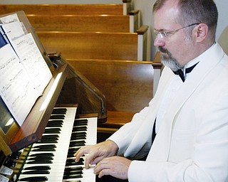 NOTEWORTHY EVENT: Thomas Pavlechko, cantor and composer-in-residence at St. Martin's Lutheran Church in Austin, Texes, rehearses to get into peak-performance level for an organ concert set for 7 tonight at Calvary Baptist Church in Boardman, where he once served as organist. The former Mahoning Valley resident coached actor Brad Pitt on the organ and piano for an upcoming movie.