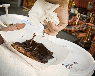 Barbeque sauce came in 5-gallon buckets and a hundred varieties at the Miller Lite National Rib Cook-Off Saturday, August 16, 2008 outside the Chevy Centre. Daniel C. Britt.