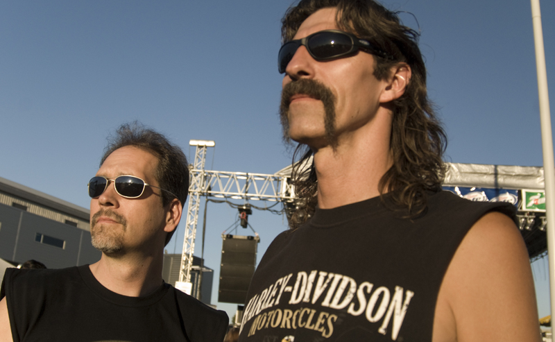 These two rock fans and many others arrived early and continually scanned the horizon for the arrival of Kansas, slated to take the stage at 10 p.m.