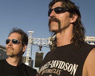 These two rock fans and many others arrived early and continually scanned the horizon for the arrival of Kansas, slated to take the stage at 10 p.m.