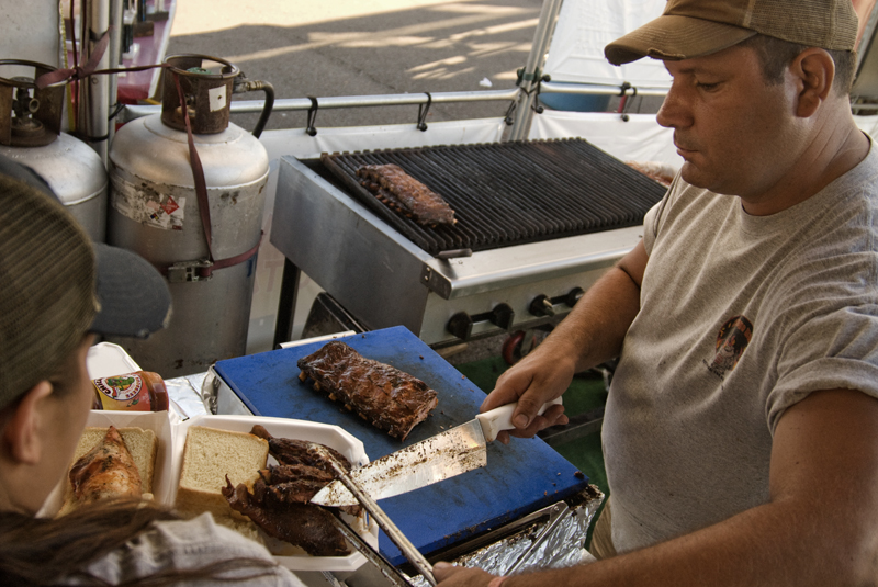 Paul Meyers of Berwyn Illinois mans the Chicago BBQ stand at the Miller Lite National Rib Cook-Off Saturday, August 16, 2008 outside the Chevy Centre. Daniel C. Britt.