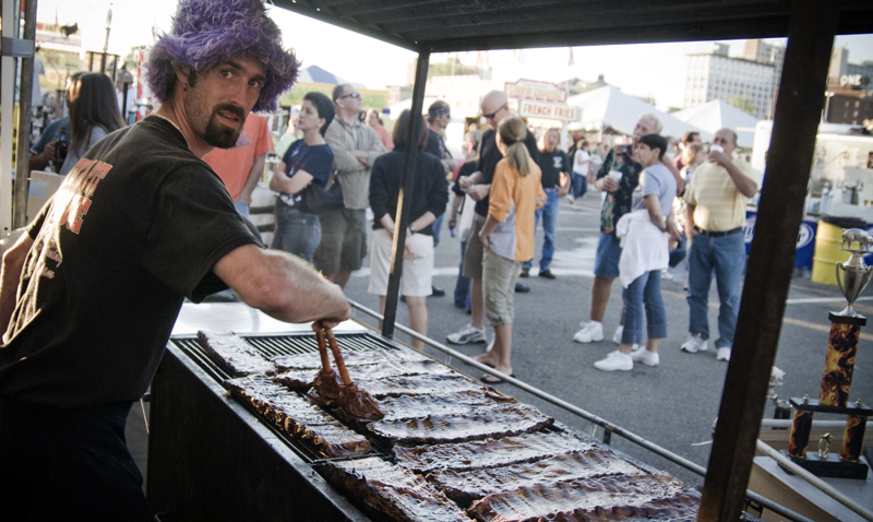 Anthony Ray soaks some ribs Saturday, August 16, 2008. Daniel C. Britt.