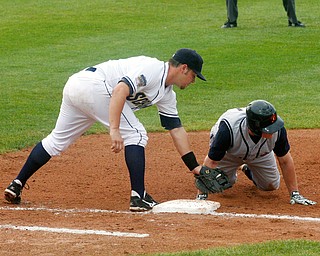 NOT IN TIME: State College's Butch Biela beats the tag of Robbie Alcombrack Sunday at Eastwood Field.