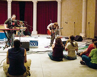 The Zou invited audience members on stage during an intimate performance at the Rukus festival in Warren Sunday August 24, 2008.