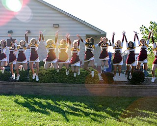 "South Range Varsity Cheerleaders are jumping for joy...it's time for FOOTBALL!"