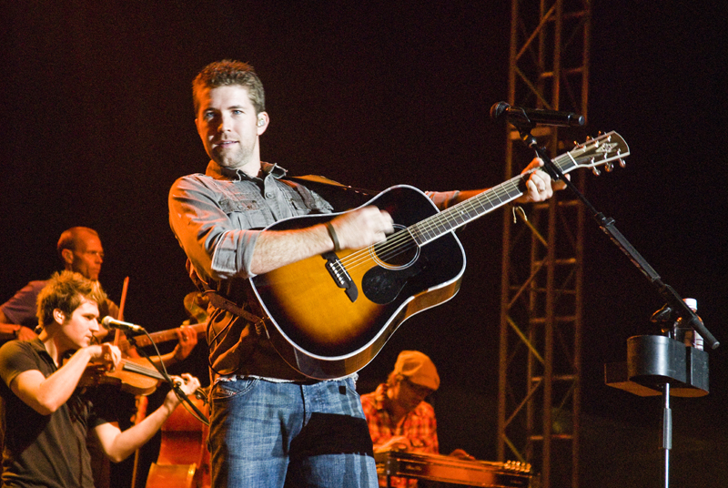 Josh Tucker getting crazy with his guitar at the Canfield Fair Sunday, August 31, 2008. Daniel C. Britt.  