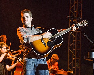 Josh Tucker getting crazy with his guitar at the Canfield Fair Sunday, August 31, 2008. Daniel C. Britt.  