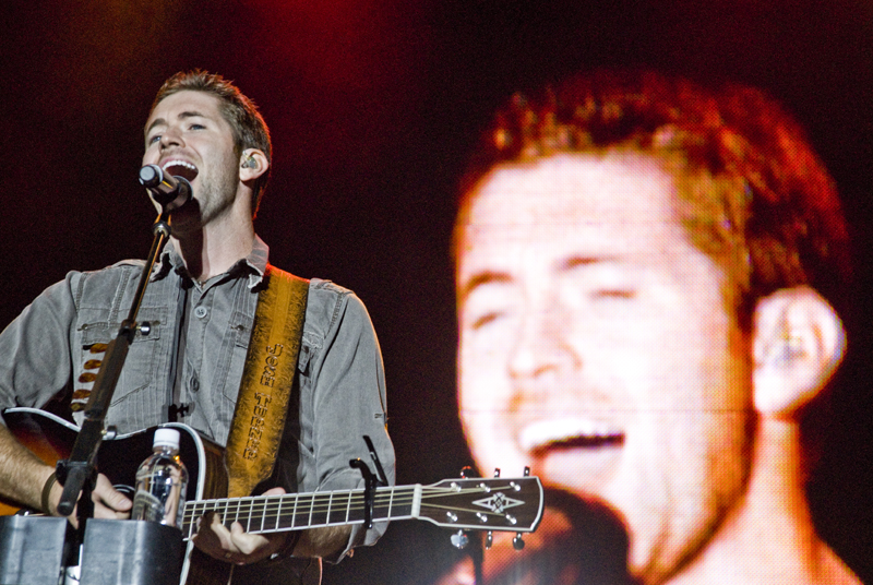 Josh Turner getting crazy with his guitar at the Canfield Fair Sunday, August 31, 2008. Daniel C. Britt. 