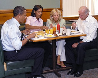 WAFFLES, BACON, EGGS: Barack Obama had waffles, bacon and two eggs over medium at the Yankee Kitchen Family Restaurant in Boardman. Joe Biden ordered the French toast. With them Saturday morning are their wives, Michelle Obama and Jill Biden.