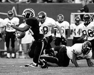 ON THE MOVE: Anthony IN=ngram of Niles runs for yardage during Friday's game against Liberty.