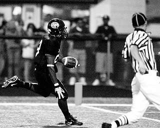 IN THE CLEAR: Fitch's Aaron Edwards runs into the end zone to complete a 51-yard TD reception from Jon Ballard during Friday's game.