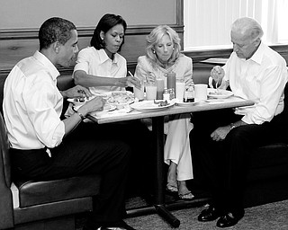WAFFLES, BACON, EGGS: Barack Obama had waffles, bacon and two eggs over medium at the Yankee Kitchen Family Restaurant in Boardman. Joe Biden ordered the French toast. With them Saturday morning are their wives, Michelle Obama and Jill Biden.