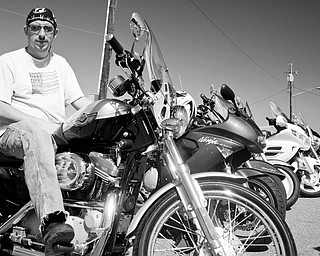BIKES GALORE: Motorcycle enthusiast Donald Husk of Warren attended Sunday's car show.
