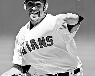 LOSING PITCHER: Cleveland Indians pitcher Zach Jackson delivers in the first inning of Sunday's game against teh Seattle Mariners at Progressive Field in Cleveland. Jackson suffered the loss in the Mariners' 6-4 win.