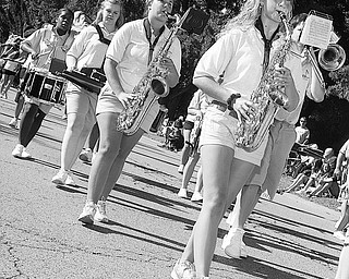 MARCHING ALONG: The Sharon high School Tiger Marching Band was among the units that took part int eh Buhl Day parade. The annual event was Monday in Hermitage's Buhl Farm Park.