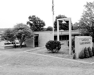 JOINING FORCES: The Monaca High School of the current Monaca District is show in Monaca, Pa. The future of the high school building will be decided when the marriage of the Center Area and Monaca school districts takes place. The merging of the districts northwest of Pittsburgh is part of a gradual, ongoing national progression toward fewer districts for public schools.