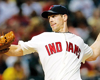 MOUND RENOWN: Indians lefty Cliff Lee throws home during the fourth inning of Monday's game against teh White Sox at Progressive Field. Lee tossed a five-hit shutout to win his 20th game.