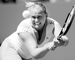 OPEN CHALLENGER: Anna-Lena Groenefield returns a shot to Dinara Safina during their tennis match Monday at the U.S. Open tennis tournament in New York.