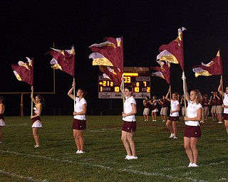 "South Range Flagline has their flags waving proud during the Fight Song."