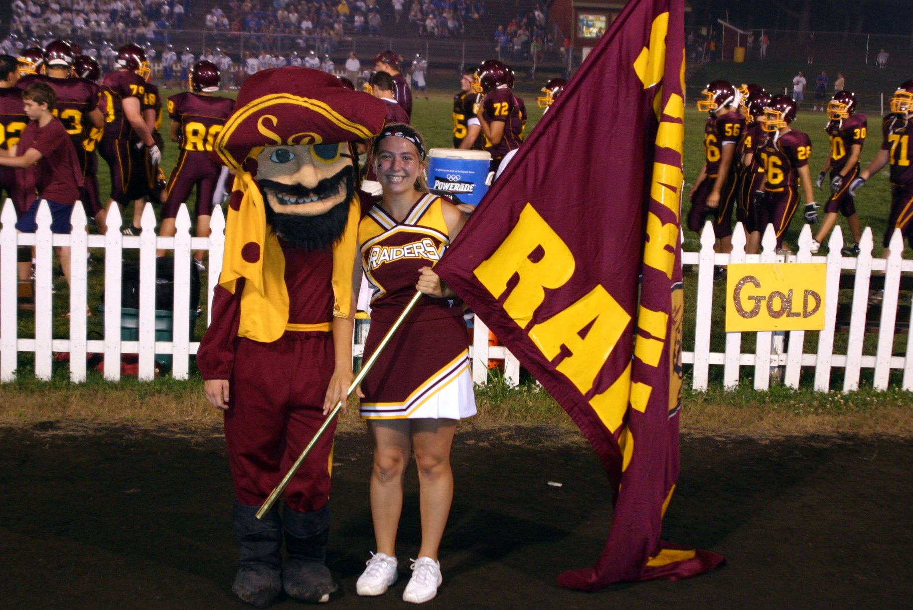 The SOuth RAnge Raider Guy, Andrew Humansky, and the Flag Runner,
Brittany Haynes, pose  long enough for a photo."