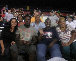 Austintown Fitch Football Parents celebrate a win Friday over Youngstown East 49-12. From left Christopher & Demitrious Davis' mom & dad, John Ballards' mom (Fitch starting QB), Colby & Calen Jacobs' mom. Back row from left Dre'lon Simmons' mom and Duante Andersons' mom. GO FALCONS! 2-0.