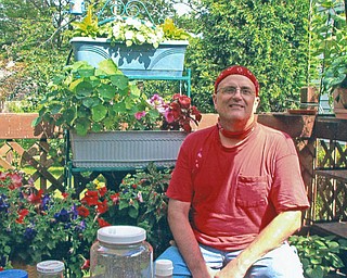 Rick Miller has a flower garden at his home in Austintown. The photo is from Virginia Miller of Youngstown.