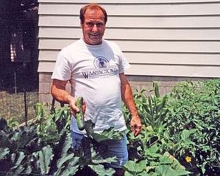 Robert Bushman of Boardman Township grows cucumbers, eggplant, onions, tomatoes, peppers and herbs, which he shares with friends and neighbors. (Photo from Patricia Bushman)