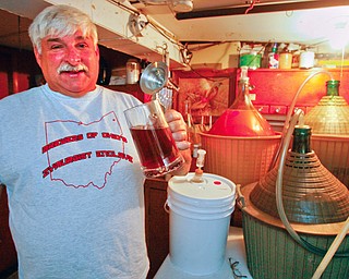 BREWMEISTER: Richard Tomory of Campbell is a prize-winning brewer who has produced award-winning beer concoctions from this nook in his basement. His 2002 mead - a honey-based alcoholic drink - took the gold medal in the annual American Homebrewers Association national competition.