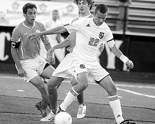 LIBERTY - LABRAE - (11) Eric Wolf battles (12) Jacob Brewster as (8) Pat McGarry looks on during their game Wednesday night at Liberty