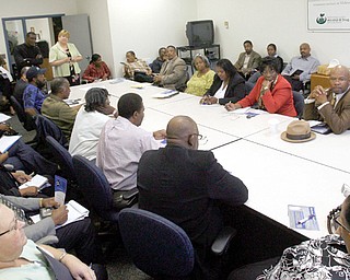 REJOINING SOCIETY: Doris Primm addresses a group of faith-based agency leaders about the Access to Recovery program that helps criminals re-enter society after serving their sentences.