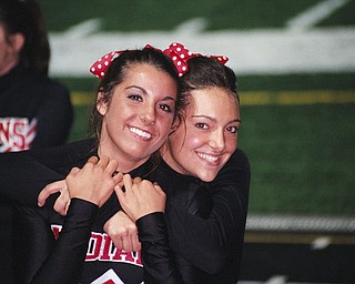 time out for a picture varsity cheerleaders Julia Guerrieri and Giovanna DelGarbino