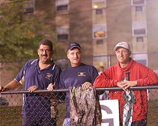 TOM HARKLERODE, RAY CARLSON AND JOHN HVIZDAK POSED FOR A PICTURE AS THE LOWELLVILLE ROCKETS BEAT JACKSON MILTON 27 TO 0.