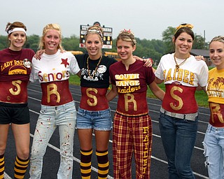 "South Range seniors Jessica Kane, Courtney Ruggles, Taylor Hiner,
Alyssa Gortz, Lisa Dory, and Maria Garbars show off their spirit at
the South Range-Springfield football game."