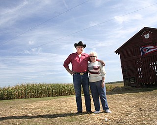 Linda and Henry Lipps stand near their cornfield where John McCain appeared on GMA. 