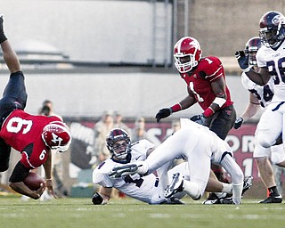 OOPS: Youngstown State quarterback Brandon Summers (6) spirals out of control against Liberty Saturday at Stambaugh Stadium.