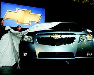 Chevrolet unveiled its new Cruze to the press Wednesday, September 24, 2008 at the Paris Auto Show. 

Expected to get close to 40 miles-per-gallon, the Cruze will go on sale in Europe next March. Production for U.S. sales will begin in 2010. 
