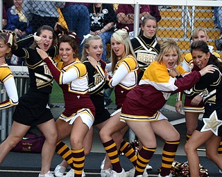 "South Range Cheerleaders and Crestview Cheerleaders play friendly
rivals before the South Range-Crestview game Friday night."