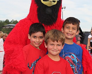 Cousin's Eddy and Alexander Duko, and Drew Carrocce with the Canfield
Cardinal mascot, get ready to cheer on the Canfield Cardinal football
team!