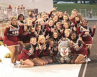 The Liberty High School Cheerleaders and the Leopard's mascot (Cody Smith)
put their "L's" up to show their support for the Liberty Leopard's football
team who improved to 5 & 0 after defeating Salem.