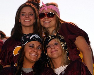 "South Range sophomores, Kenzie Pifer, Chelsie Willison, Sam Smith,
and Kelly Johnson, are showing their spirit at Friday night's game
again Lisbon."