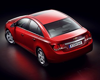 Chevrolet unveiled its new Cruze to the press Wednesday, September 24, 2008 at the Paris Auto Show. 

Expected to get close to 40 miles-per-gallon, the Cruze will go on sale in Europe next March. Production for U.S. sales will begin in 2010. 
