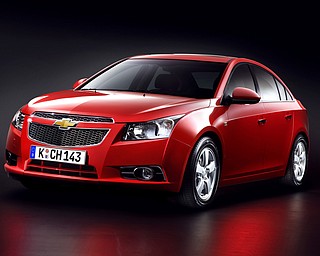 Chevrolet unveiled its new Cruze to the press Wednesday, September 24, 2008 at the Paris Auto Show. 

Expected to get close to 40 miles-per-gallon, the Cruze will go on sale in Europe next March. Production for U.S. sales will begin in 2010. 
