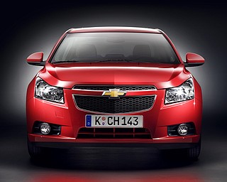 Chevrolet unveiled its new Cruze to the press Wednesday, September 24, 2008 at the Paris Auto Show. 

Expected to get close to 40 miles-per-gallon, the Cruze hits the European market next March. Production for U.S. sales will begin in 2010. 