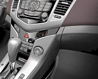 Chevrolet unveiled its new Cruze to the press Wednesday, September 24, 2008 at the Paris Auto Show. 

Expected to get close to 40 miles-per-gallon, the Cruze will go on sale in Europe next March. Production for U.S. sales will begin in 2010. 
