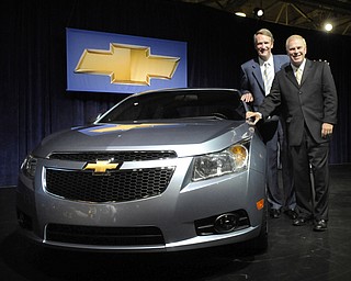 Chevrolet unveiled its new Cruze to the press Wednesday, September 24, 2008 at the Paris Auto Show. 

Expected to get close to 40 miles-per-gallon, the Cruze will go on sale in Europe next March. Production for U.S. sales will begin in 2010. 

