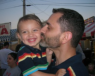 Attached is a picture of Gabriel J. Bettross (18 months) with his dad, Mike Bettross, at the Canfield Fair. Gabriel just went on the slide with his dad for the first time! Parents, Carla and Mike Bettross, Boardman; Grandpa Myron Dobkowski, Poland; Grandma and Grandpa Lousie and Jerry Bettross, Ellsworth; Grandma Candi Carson, Tarpon Springs, Florida.
Enjoy,
Carla Bettross