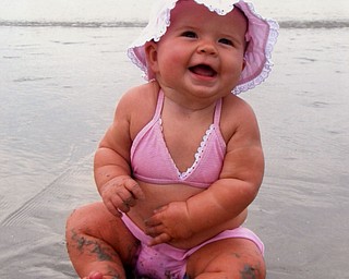 Brynn Houser, 6 months, takes her first vacation in Hilton Head, S.C., with her parents, Jim and Shay Houser of Cranberry, Pa. Photo submitted by grandparents, Gary and Denise Houser of Boardman.